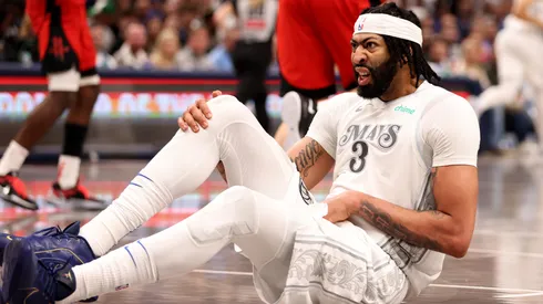 Anthony Davis #3 of the Dallas Mavericks reacts after an injury in the game against the Houston Rockets at American Airlines Center on February 08, 2025 in Dallas, Texas.