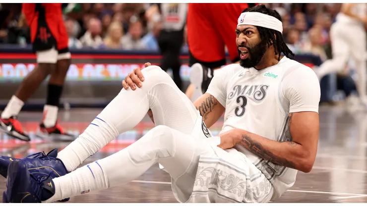 Anthony Davis #3 of the Dallas Mavericks reacts after an injury in the game against the Houston Rockets at American Airlines Center on February 08, 2025 in Dallas, Texas.