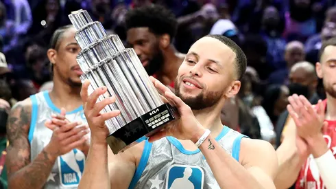 Stephen Curry #30 of Team LeBron holds the Kobe Bryant Trophy during the 2022 NBA All-Star