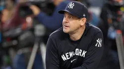 Manager Aaron Boone #17 of the New York Yankees watches.
