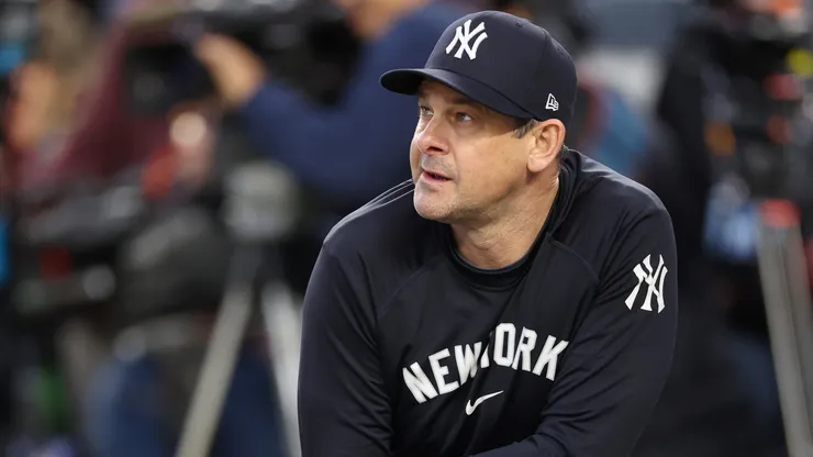 Manager Aaron Boone #17 of the New York Yankees watches.
