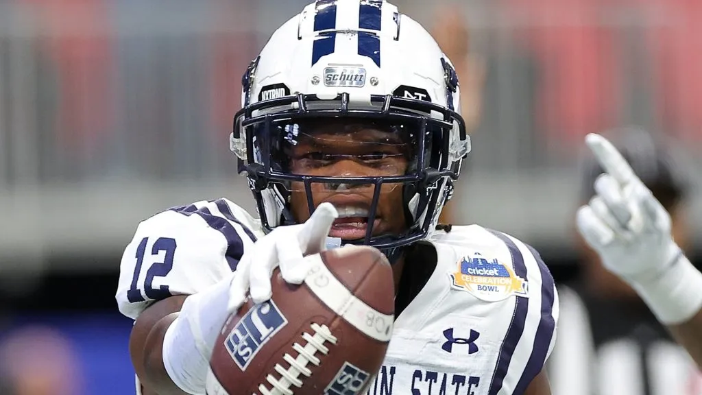 Travis Hunter #12 of the Jackson State Tigers reacts after pulling in a touchdown reception against the North Carolina Central Eagles during the second half of the Cricket Celebration Bowl at Mercedes-Benz Stadium on December 17, 2022 in Atlanta, Georgia.