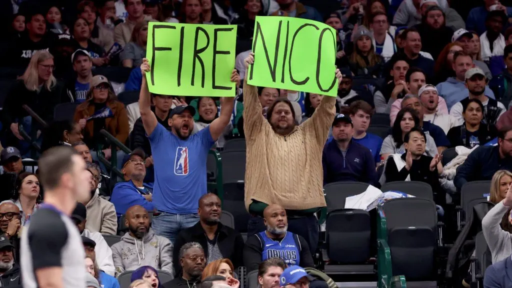 Dallas Mavericks fans hold up a sign referring to Mavs general manager Nico Harrison during the game against the Sacramento Kings at American Airlines Center. (Tim Heitman/Getty Images)