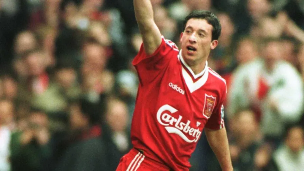 Robbie Fowler of Liverpool celebrates scoring the third goal against Aston Villa during the Premiership game at Anfield in 1996. (Source: Ben Radford/Allsport)
