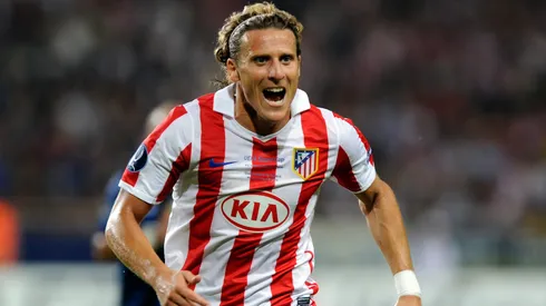 Diego Forlan of Atletico Madrid competes for the ball during the UEFA Super Cup between Inter and Atletico Madrid.