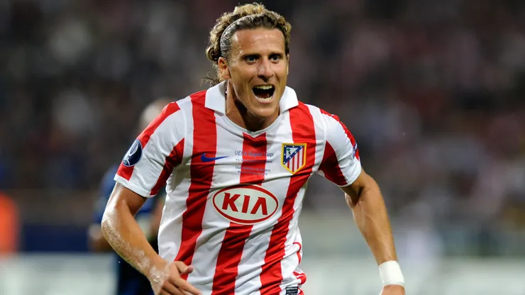 Diego Forlan of Atletico Madrid competes for the ball during the UEFA Super Cup between Inter and Atletico Madrid.