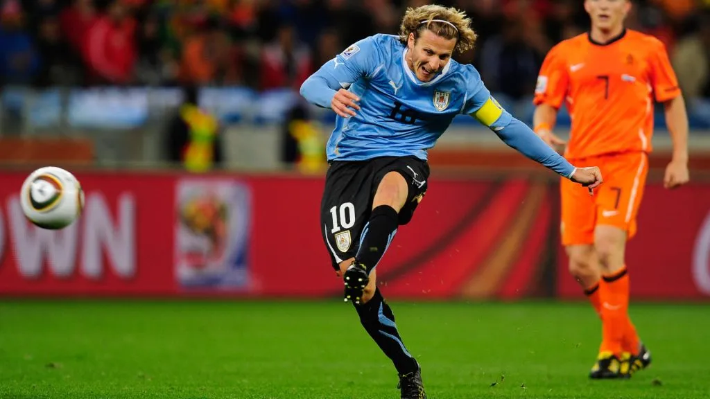 Diego Forlan shoots a long range effort and scores his teamās first goal during the 2010 FIFA World Cup South Africa Semi Final match between Uruguay and the Netherlands. (Jamie McDonald/Getty Images)