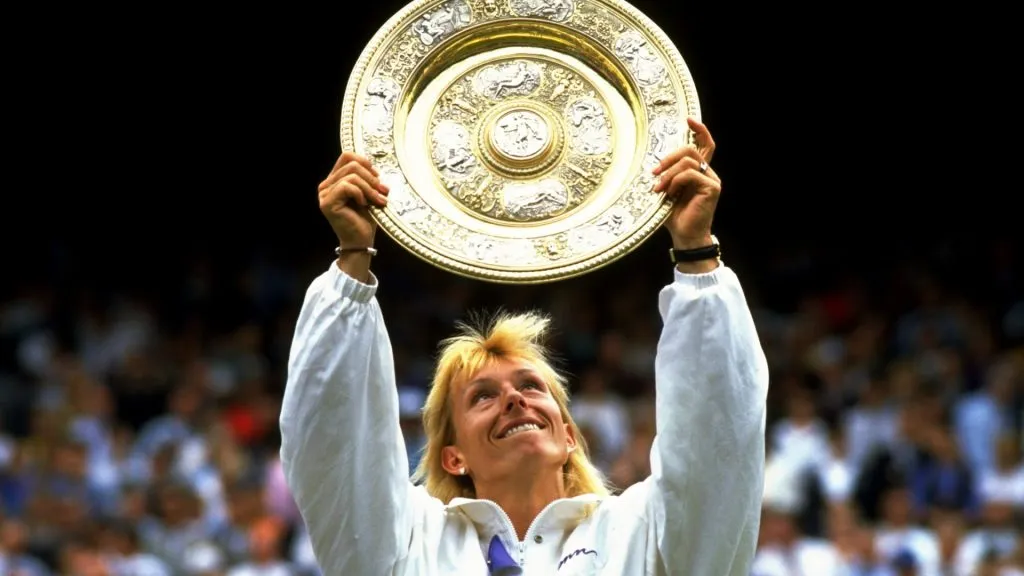 Martina Navratilova of the USA holds up the winners” plate after winning the Wimbledon Championships. (Allsport UK /Allsport/ Getty Images)