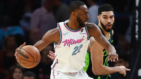 Andrew Wiggins #22 of the Miami Heat controls the ball against Jayson Tatum #0 of the Boston Celtics on February 10, 2025.