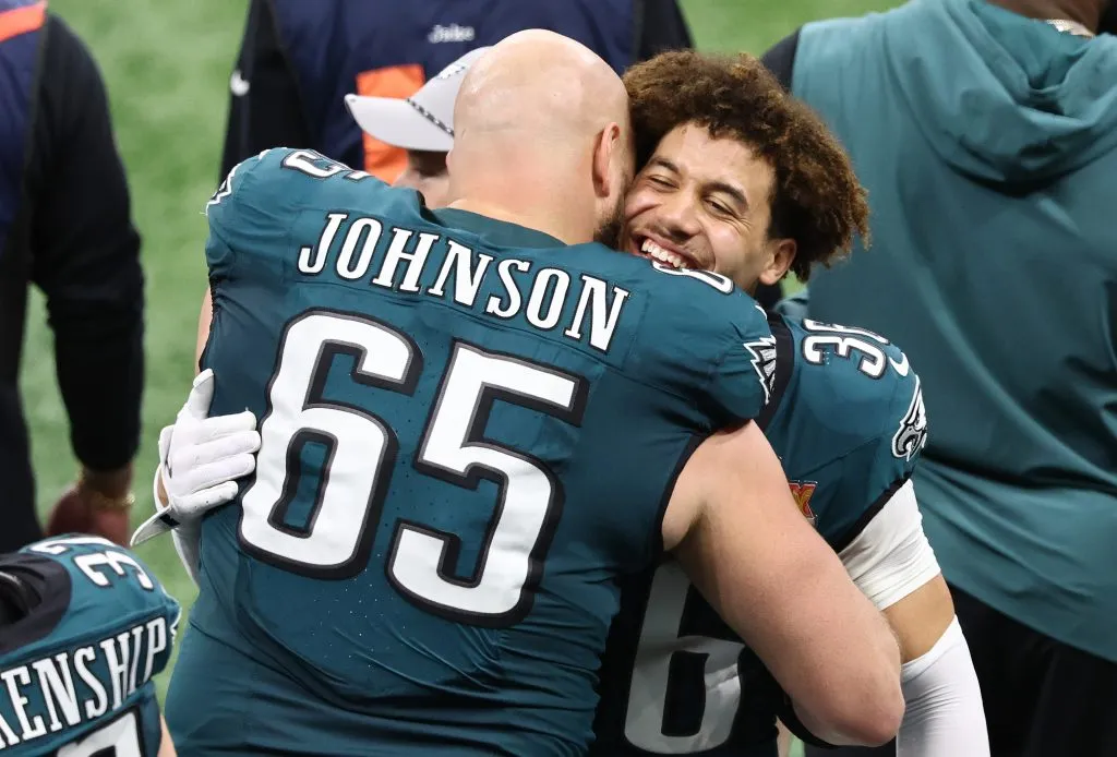 NEW ORLEANS, LOUISIANA – FEBRUARY 09: Lane Johnson #65 and Tristin McCollum #36 of the Philadelphia Eagles celebrate after beating the Kansas City Chiefs 40-22 to win Super Bowl LIX at Caesars Superdome on February 09, 2025 in New Orleans, Louisiana. (Photo by Cindy Ord/Getty Images)