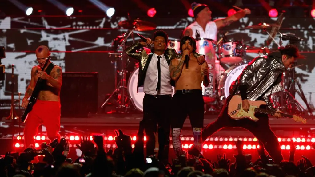 Bruno Mars performs with Anthony Kiedis and Flea of the Red Hot Chili Peppers during the Pepsi Super Bowl XLVIII Halftime Show at MetLife Stadium on February 2, 2014. (Source: Elsa/Getty Images)