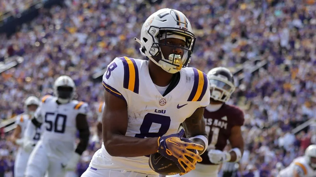 Malik Nabers #8 of the LSU Tigers scores a touchdown during the first half against the Texas A&amp;M Aggies at Tiger Stadium on November 25, 2023 in Baton Rouge, Louisiana.
