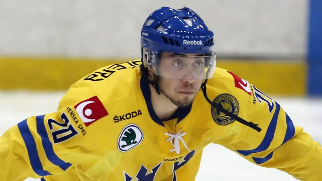 Mika Zibanejad #20 of Team Sweden skates against the USA White Squad at the USA hockey junior evaluation camp at the Lake Placid Olympic Center on August 6, 2012 in Lake Placid, New York. Sweden defeated the USA 5-1.