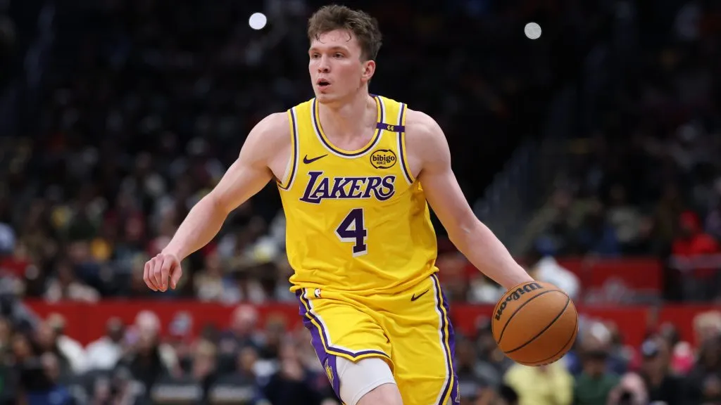 Dalton Knecht #4 of the Los Angeles Lakers controls the ball against the Washington Wizards during the second half at Capital One Arena. (Patrick Smith/Getty Images)
