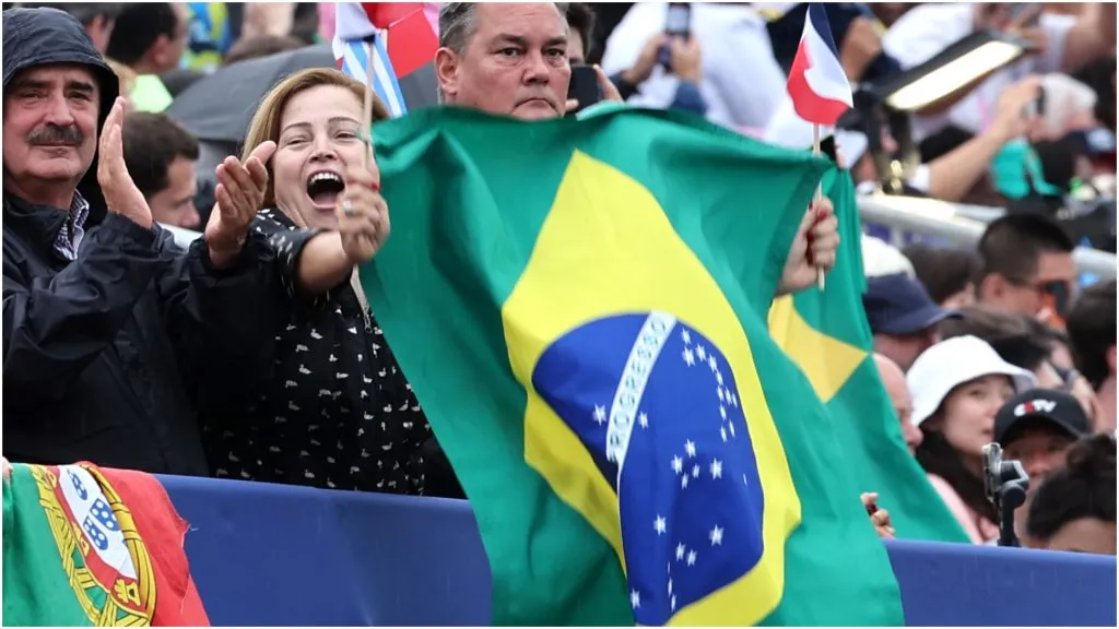 Fans wave the national flag of Brazil – Arturo Holmes/Getty Images