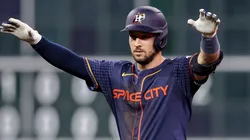 Alex Bregman #2 reacts after hitting a two RBI double.