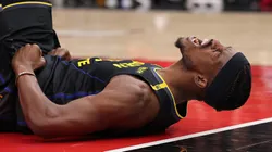 Jimmy Butler #10 of the Golden State Warriors celebrates a layup and a foul against the Chicago Bulls during the second half at the United Center on February 08, 2025 in Chicago, Illinois.