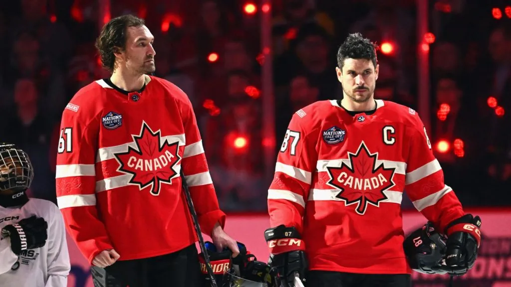 Mark Stone #61 and Sidney Crosby #87 of Team Canada stand for the national anthem prior to playing against Team Sweden during the NHL 4 Nations Face-Off at Bell Centre on February 12, 2025 in Montreal, Quebec.