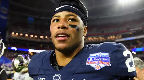 Running back Saquon Barkley #26 of the Penn State Nittany Lions reacts on the field after defeating the Washington Huskies 35-28 in the PlayStation Fiesta Bowl at University of Phoenix Stadium on December 30, 2017 in Glendale, Arizona. The Penn State Nittany Lions won 35-28.