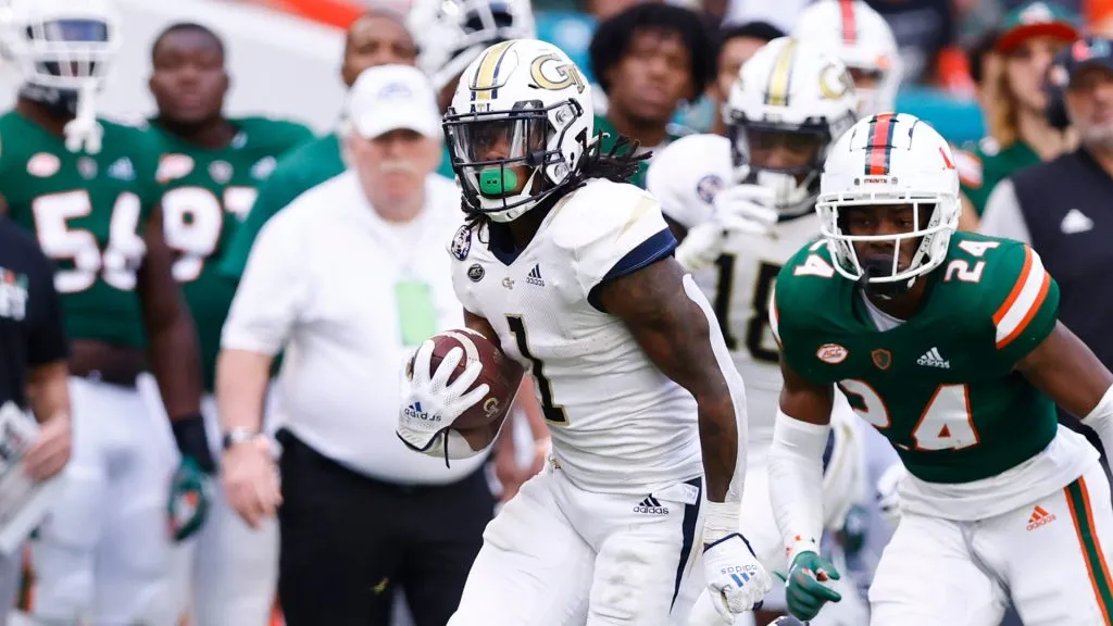 Jahmyr Gibbs #1 of the Georgia Tech Yellow Jackets runs for a 50-yard touchdown reception against the Miami Hurricanes during the second half at Hard Rock Stadium on November 06, 2021 in Miami Gardens, Florida.