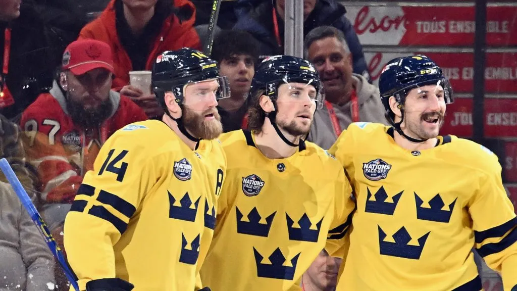 Mattias Ekholm #14, Adrian Kempe #10 and Filip Forsberg #9 of Team Sweden celebrate a goal by Kempe at 1:54 of the third period against Team Canada in the NHL 4 Nations Face-Off at Bell Centre on February 12, 2025 in Montreal, Quebec, Canada.