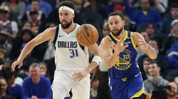 Stephen Curry #30 of the Golden State Warriors is guarded by Klay Thompson #31 of the Dallas Mavericks at Chase Center.