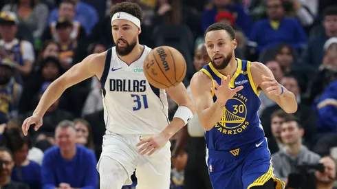 Stephen Curry #30 of the Golden State Warriors is guarded by Klay Thompson #31 of the Dallas Mavericks at Chase Center.