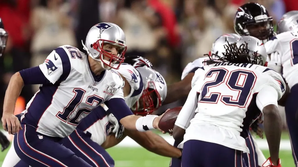 Tom Brady #12 of the New England Patriots hands the ball off to LeGarrette Blount #29 during the second quarter of Super Bowl 51 against the Atlanta Falcons at NRG Stadium on February 5, 2017 in Houston, Texas.