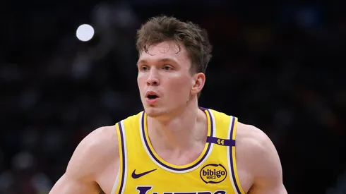 Dalton Knecht #4 of the Los Angeles Lakers controls the ball against the Washington Wizards