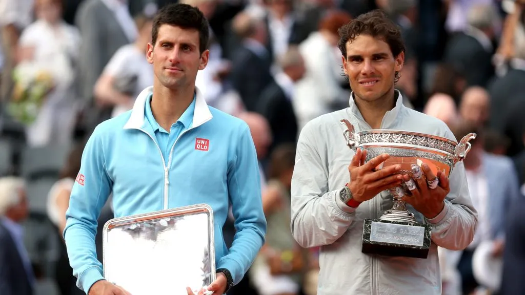 Rafael Nadal holds the Coupe de Mousquetaires as he poses with Novak Djokovic after their men’s singles final match of the 2014 Roland Garros. (Matthew Stockman/Getty Images)
