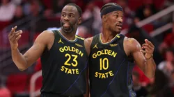 Draymond Green #23 and Jimmy Butler #10 of the Golden State Warriors speak during a game against the Houston Rockets on February 13, 2025.