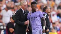 Carlo Ancelotti, Head Coach of Real Madrid, interacts with Vinicius Junior of Real Madrid during the LaLiga Santander match between Valencia CF and Real Madrid CF at Estadio Mestalla on May 21, 2023 in Valencia, Spain.