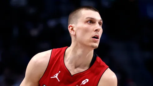 Tyler Herro #14 of the Miami Heat looks handles the ball against the Dallas Mavericks