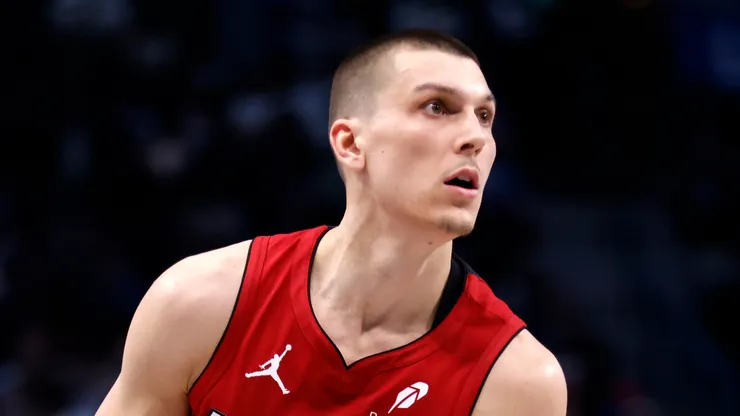 Tyler Herro #14 of the Miami Heat looks handles the ball against the Dallas Mavericks