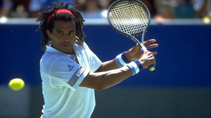 Yannick Noah in action during the 1990 Australian Open.