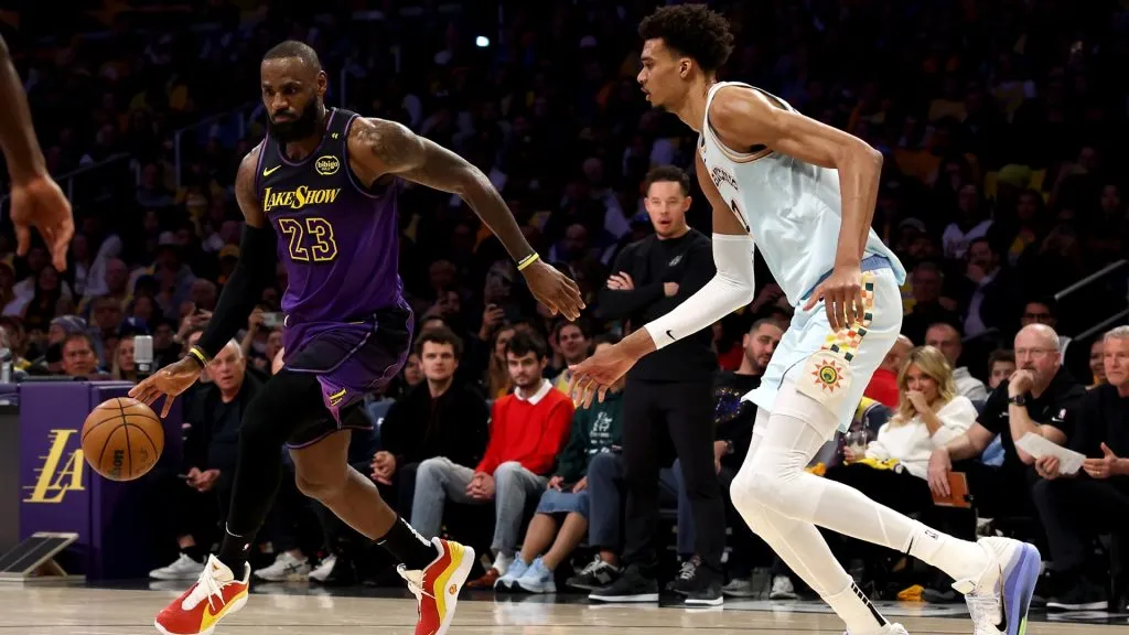 LeBron James #23 of the Los Angeles Lakers drives past Victor Wembanyama #1 of the San Antonio Spurs during the second quarter at Crypto.com Arena on January 13, 2025 in Los Angeles, California. (Photo by Katelyn Mulcahy/Getty Images)
