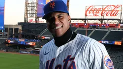 Juan Soto of the New York Mets poses with his new uniform after his introductory press conference at Citi Field on December 12, 2024 in New York City.
