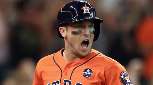 Alex Bregman #2 of the Houston Astros celebrates scoring a run on an RBI single hit by Jose Altuve #27 in the third inning against the Boston Red Sox during game two of the American League Division Series at Minute Maid Park on October 6, 2017 in Houston, Texas.