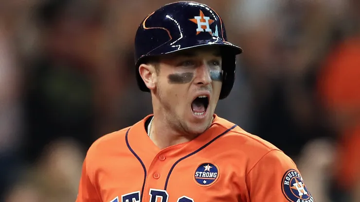 Alex Bregman #2 of the Houston Astros celebrates scoring a run on an RBI single hit by Jose Altuve #27 in the third inning against the Boston Red Sox during game two of the American League Division Series at Minute Maid Park on October 6, 2017 in Houston, Texas.