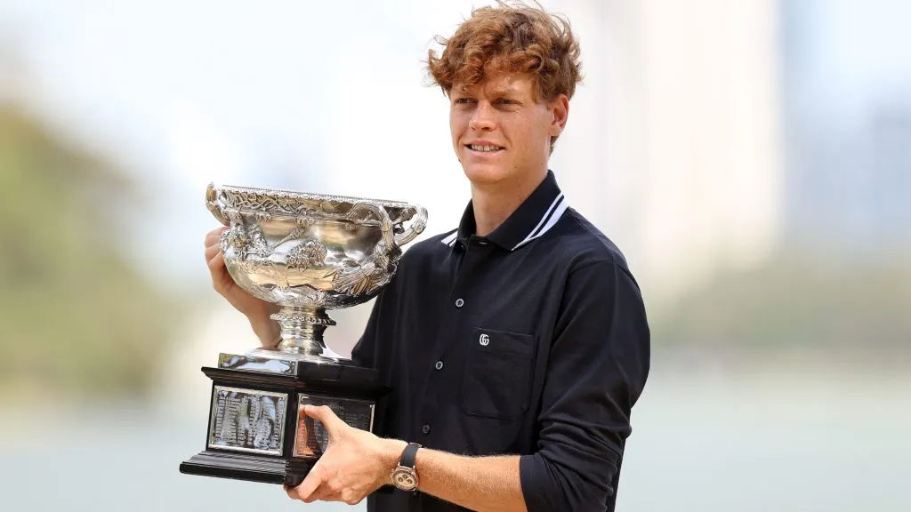 Jannik Sinner of Italy poses with the Norman Brookes Challenge Cup during the 2025 Australian Open Men’s champion media opportunity. (Kelly Defina/Getty Images)