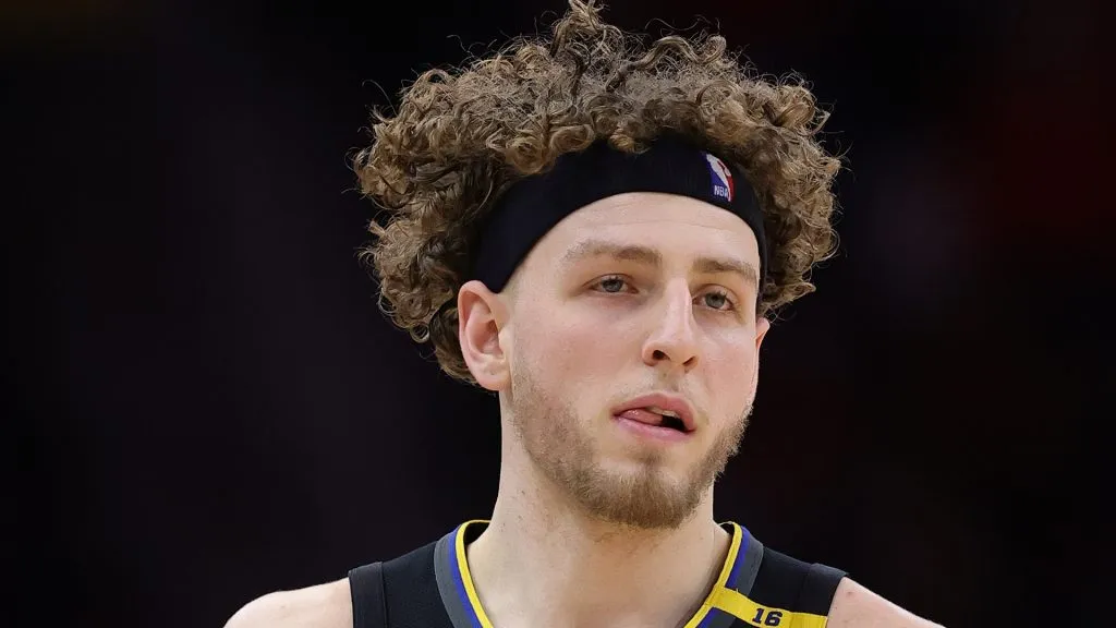 Brandin Podziemski #2 of the Golden State Warriors handles the ball against the Houston Rockets