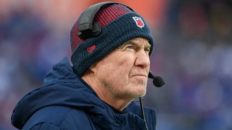 Head coach Bill Belichick of the New England Patriots looks on during the first half of a game against the Buffalo Bills at Highmark Stadium on December 31, 2023 in Orchard Park, New York.