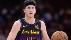 Austin Reaves #15 of the Los Angeles Lakers dribbles against the Houston Rockets during the first half at Toyota Center on January 05, 2025.