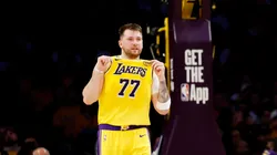 Luka Doncic #77 and LeBron James #23 of the Los Angeles Lakers