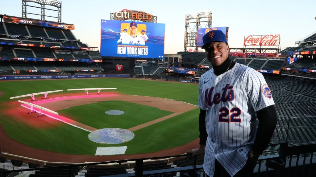 Juan Soto of the New York Mets poses with his new uniform after his introductory press conference at Citi Field on December 12, 2024. (Source: Al Bello/Getty Images)