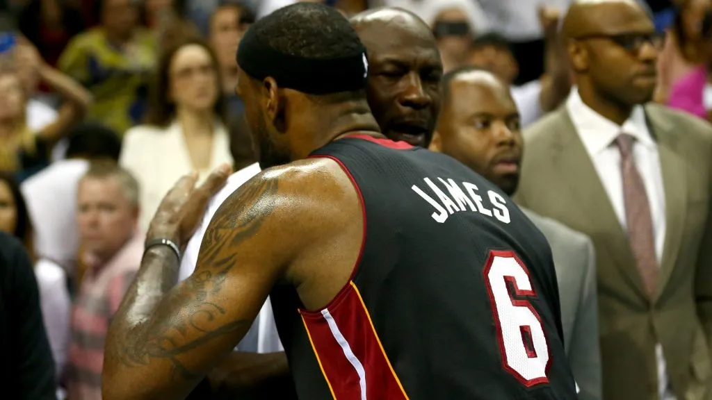 LeBron James #6 of the Miami Heat hugs Michael Jordan after defeating the Charlotte Bobcats 109-98 in Game Four of the Eastern Conference Quarterfinals during the 2014 NBA Playoffs. (Source: Streeter Lecka/Getty Images)