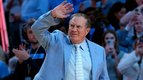Head coach Bill Belichick of the North Carolina Tar Heels addresses the crowd during halftime in the game against the La Salle Explorers at the Dean E. Smith Center on December 14, 2024 in Greensboro, North Carolina.