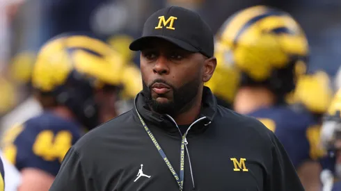Head coach Sherrone Moore of the Michigan Wolverines is seen on the field during warmups prior to a game against the Texas Longhorns at Michigan Stadium on September 07, 2024 in Ann Arbor, Michigan.