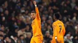 Kylian Mbappe of Real Madrid celebrates scoring his team's first goal during the UEFA Champions League 2024/25 League Knockout Play-off first leg match between Manchester City and Real Madrid C.F. at Manchester City Stadium on February 11, 2025 in Manchester, England.