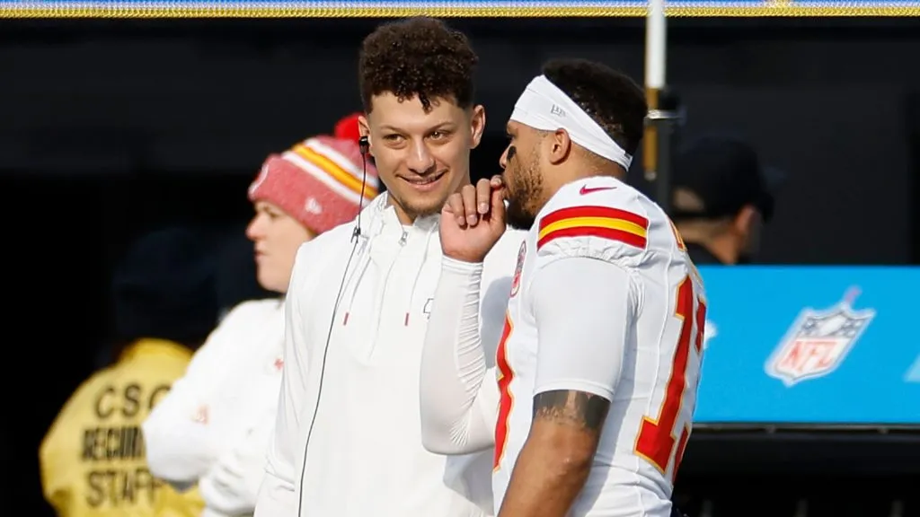 Patrick Mahomes #15 of the Kansas City Chiefs and Chris Oladokun #13 of the Kansas City Chiefs speak during a game against the Los Angeles Chargers at SoFi Stadium on January 07, 2024 in Inglewood, California.